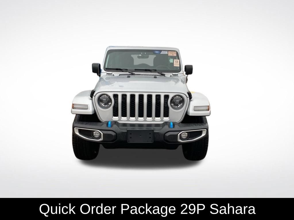 Used 2023 Jeep Wrangler 4xe Sahara 4XE with VIN 1C4JJXP65PW564948 for sale in Monticello, Minnesota