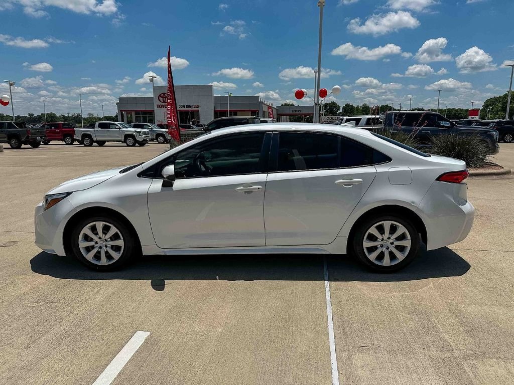Used 2023 White Toyota LE image 6