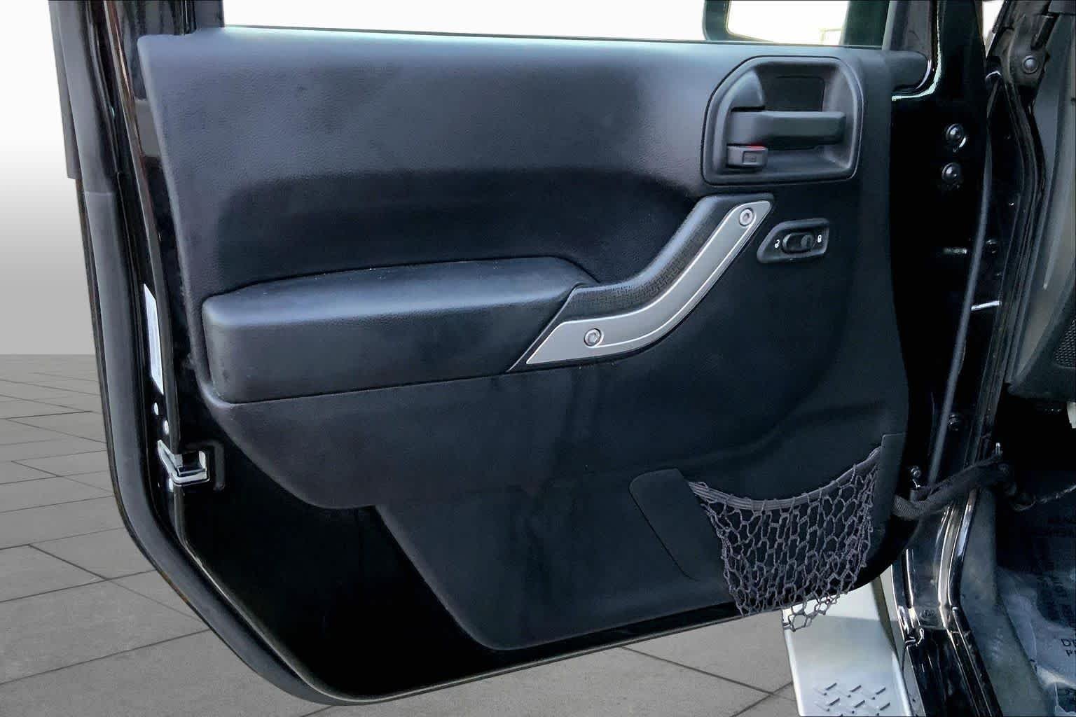 Used 2016 Black Clearcoat Jeep Sahara image 19