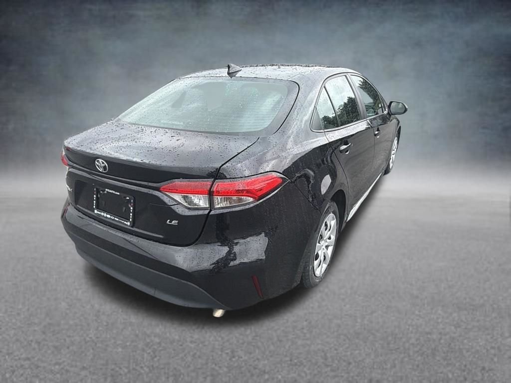 Used 2023 Midnight Black Metallic Toyota LE image 5