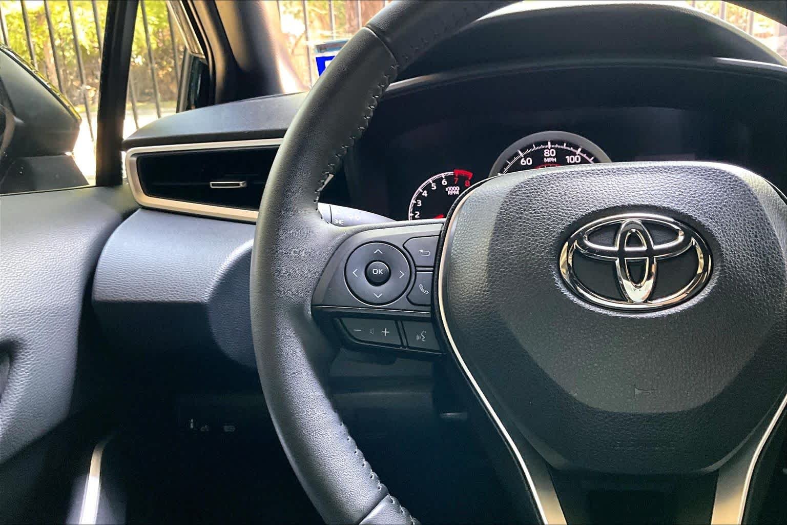 Used 2022 Black Sand Pearl Toyota SE image 23