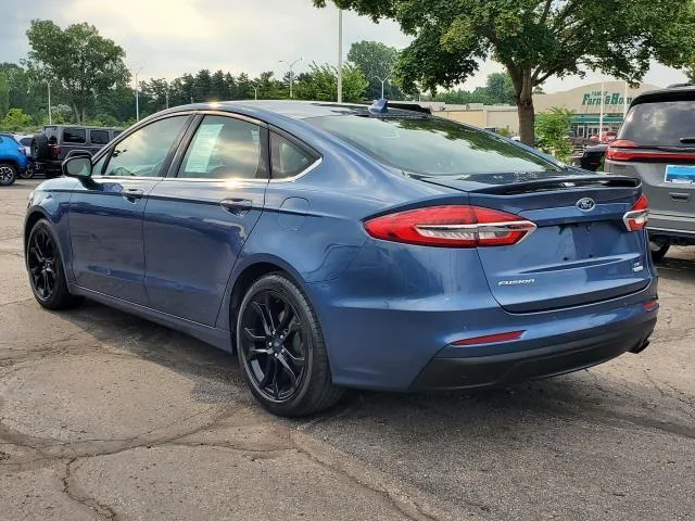 Used 2019 Blue Metallic Ford SE image 4