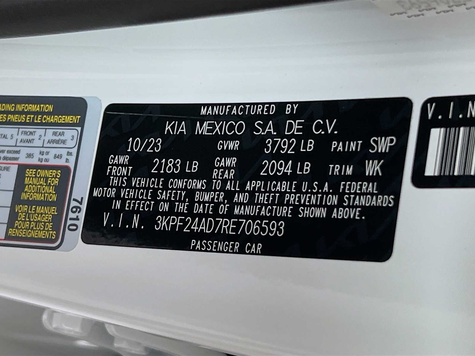 Used 2024 Snow White Pearl Kia LXS image 30