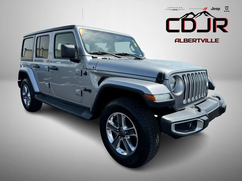 Used 2020 Silver Jeep Unlimited Sahara image 1