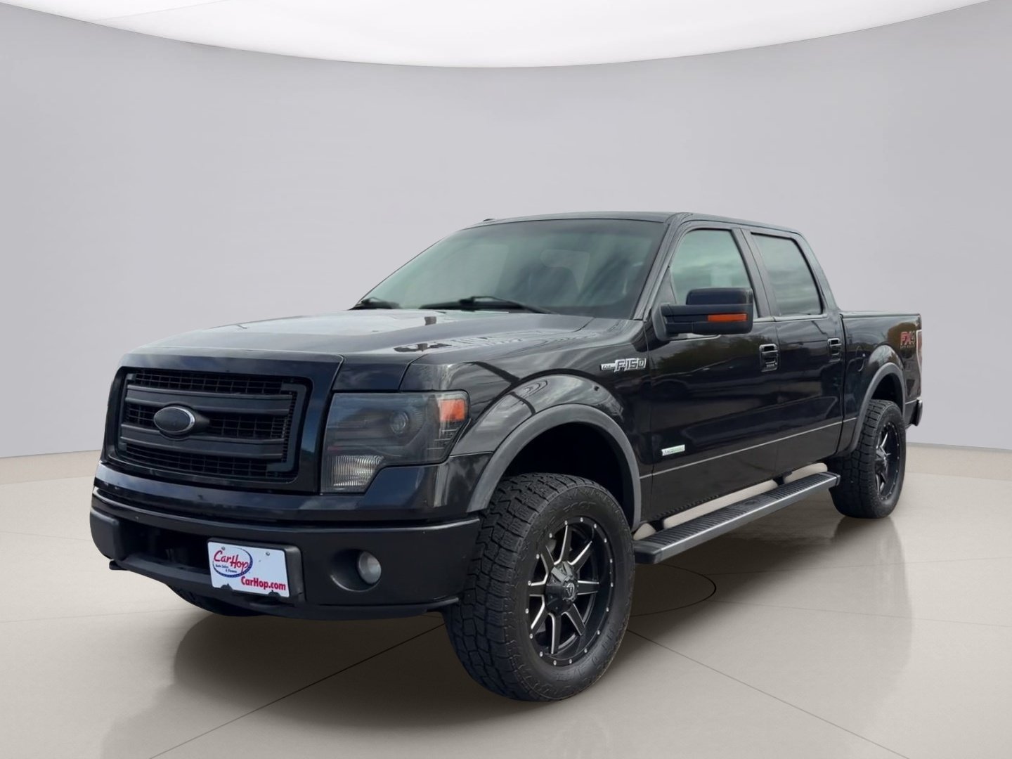 Used 2013 Black Ford FX4 image 1