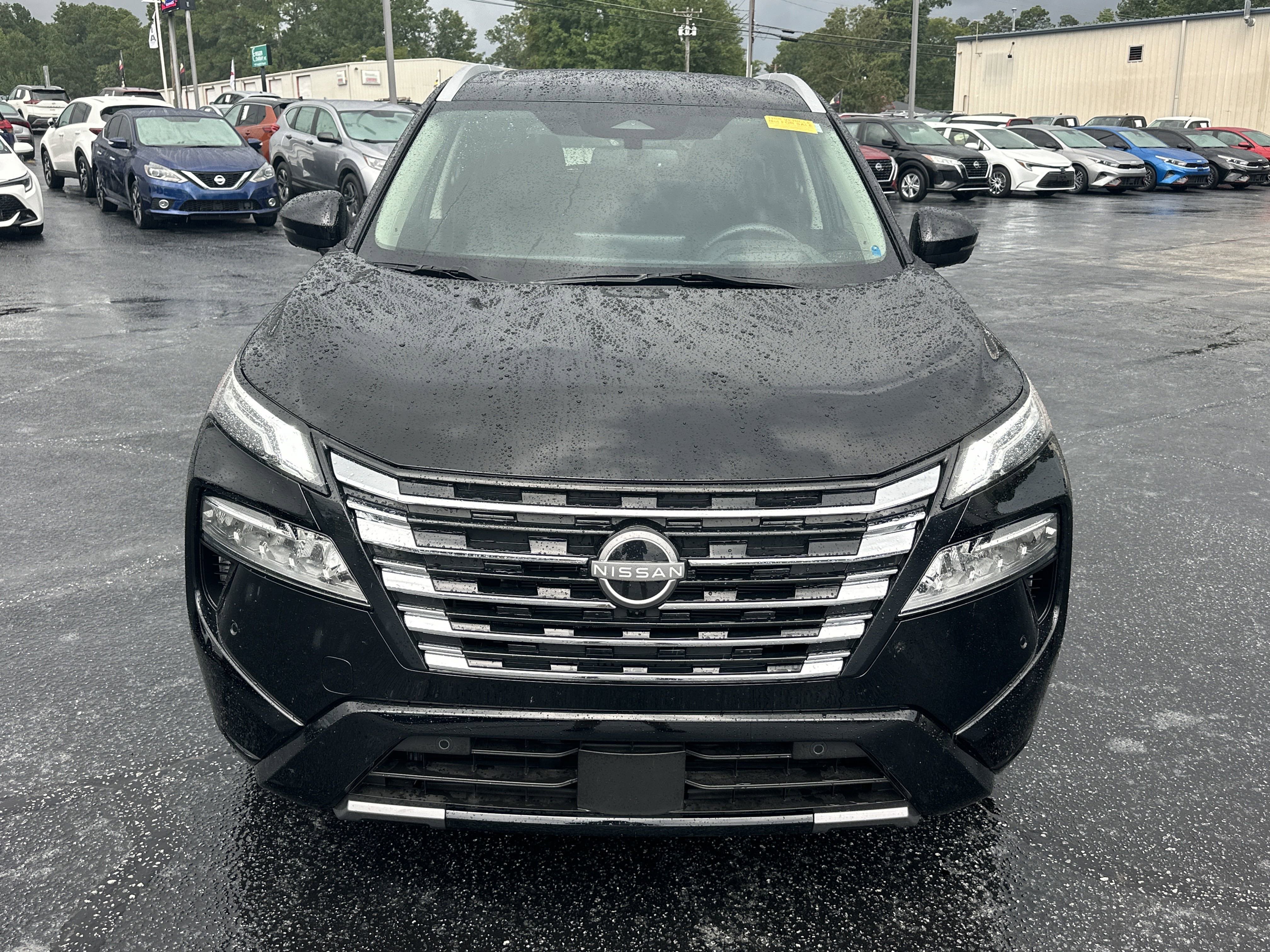 Used 2024 Super Black Nissan Platinum image 3
