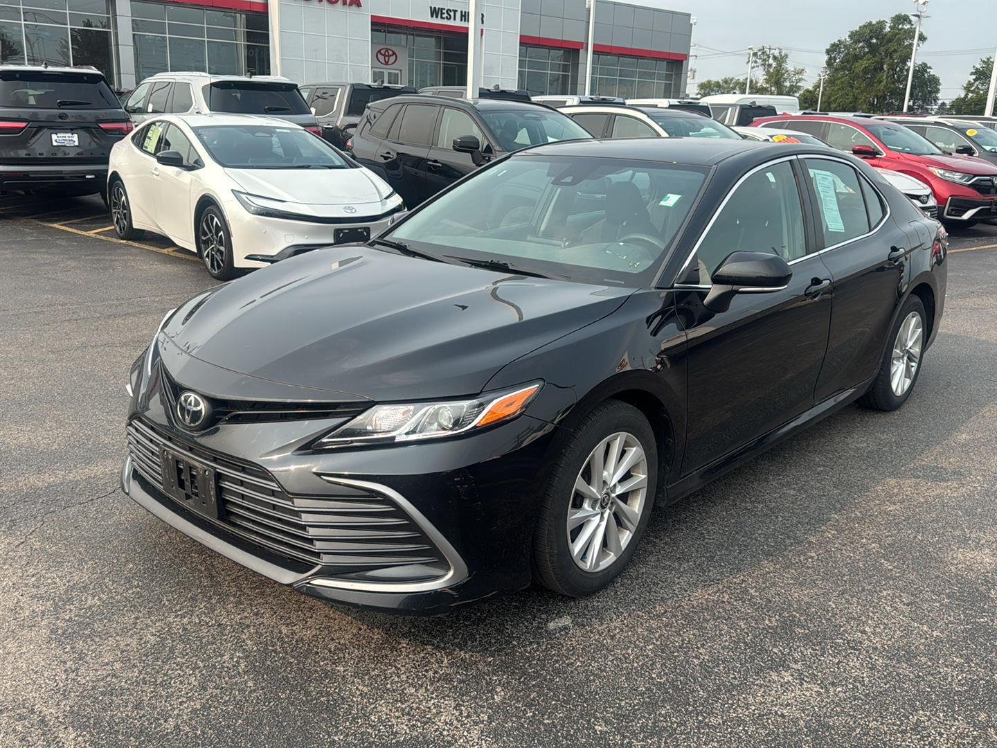 Used 2021 Midnight Black Metallic Toyota LE image 3