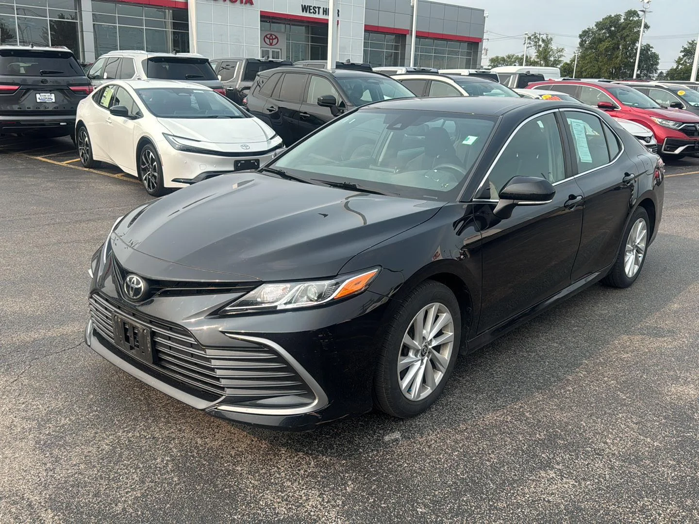 Used 2021 Midnight Black Metallic Toyota LE image 3