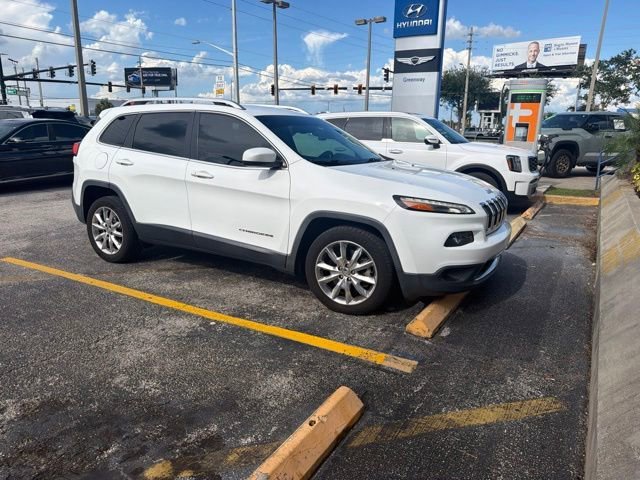 Used 2016 Bright White Clearcoat Jeep Limited image 1