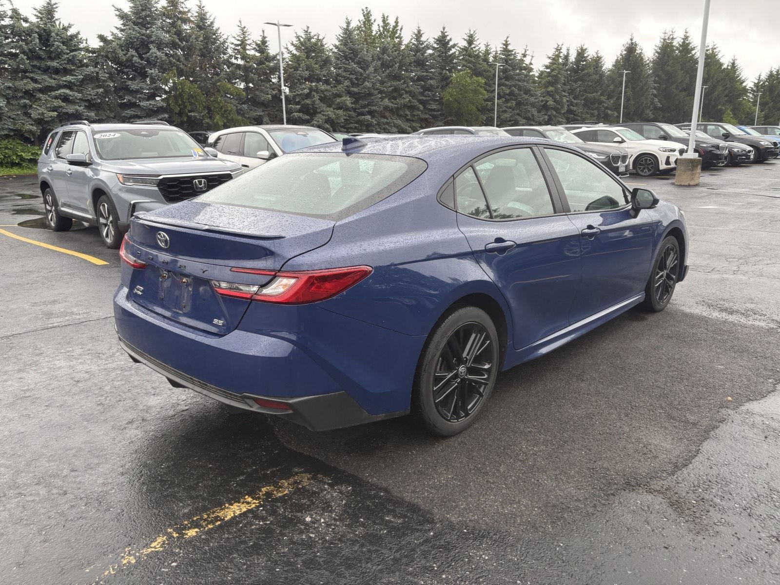 Used 2025 Reservoir Blue Toyota SE image 4