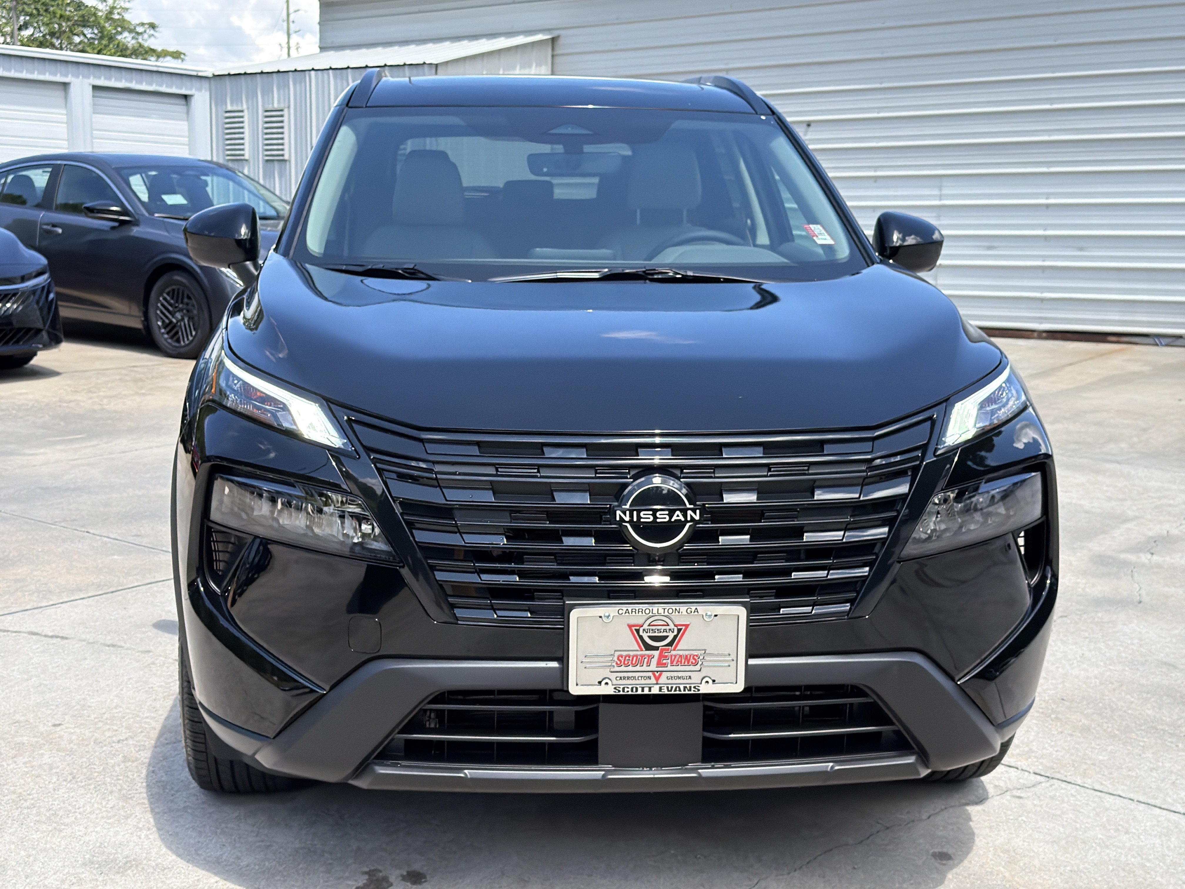 New 2026 Super Black Nissan Dark Armor image 3