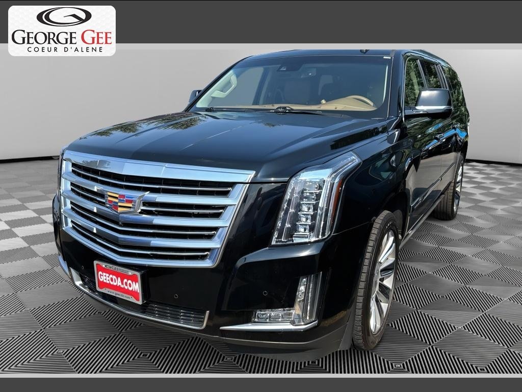 Used 2016 Black Raven Cadillac Platinum image 1