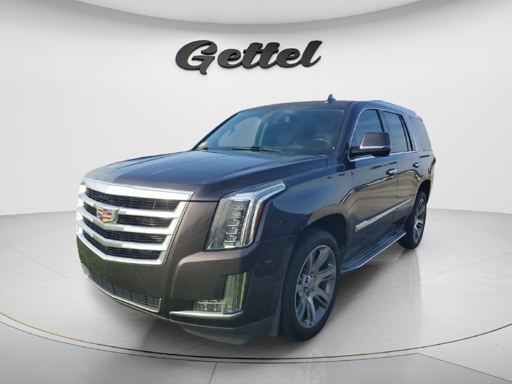 Used 2016 DARK GRANITE METALLIC Cadillac Luxury Collection image 1