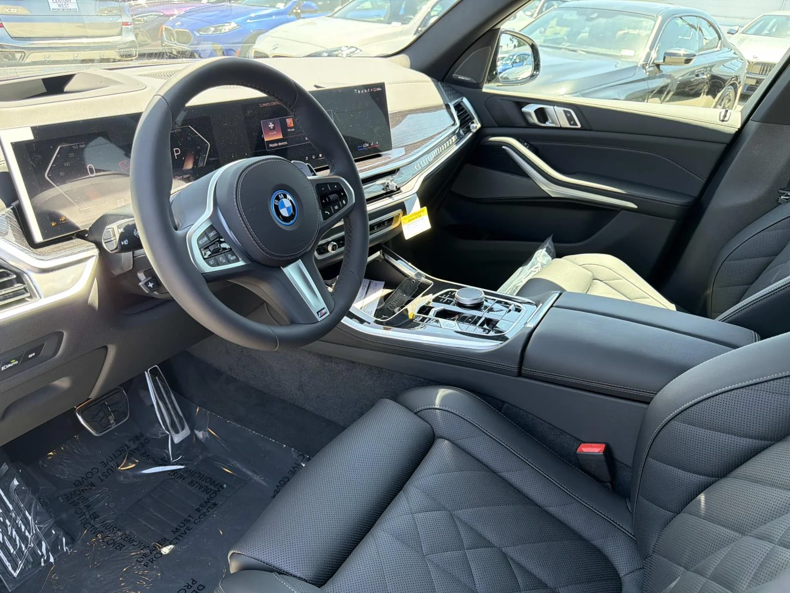 New 2026 Black Sapphire Metallic BMW xDrive50e image 12