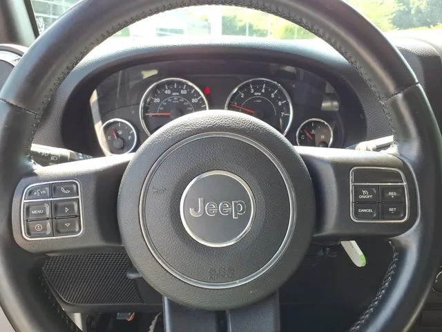 Used 2015 White Jeep Unlimited Sahara image 19
