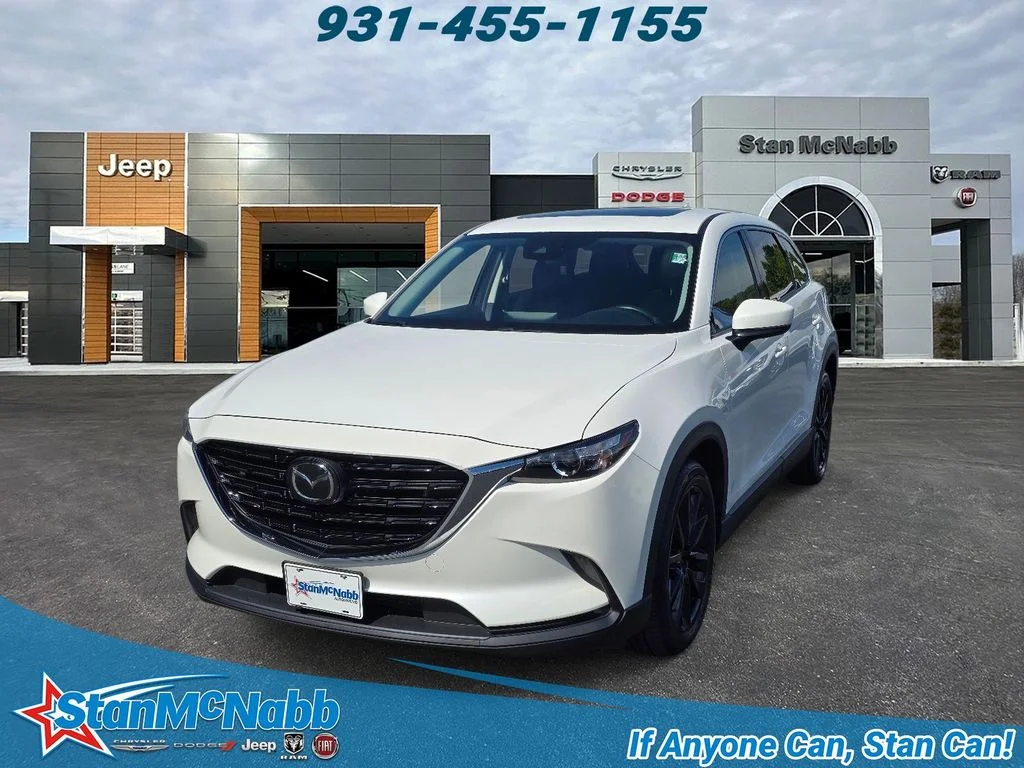 Used 2023 Snowflake White Pearl Mica Mazda Touring Plus image 1