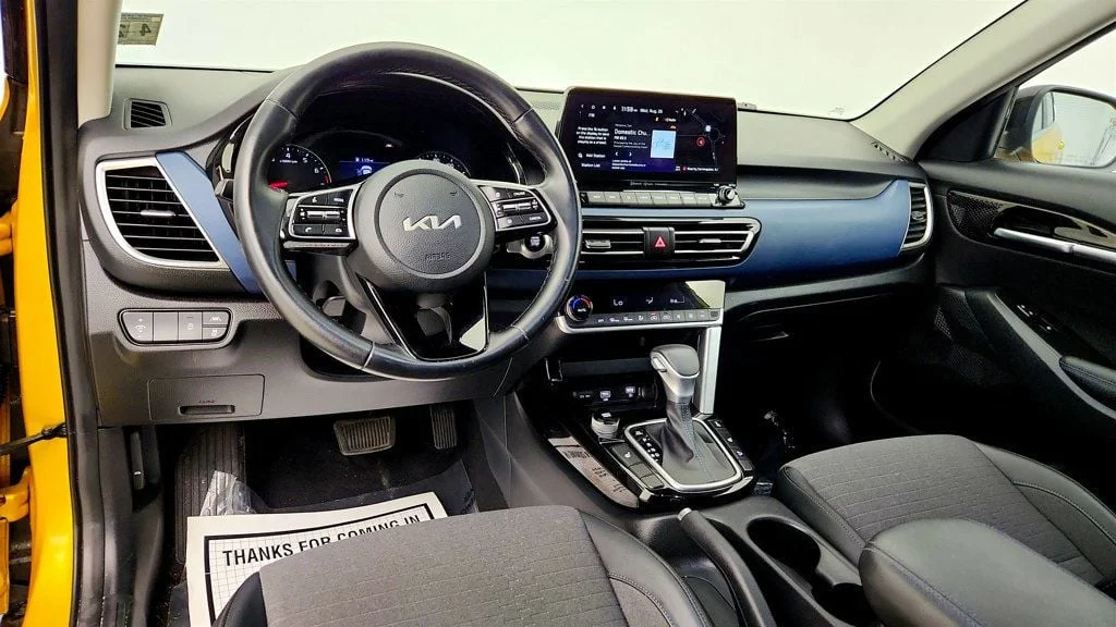 Used 2023 Starbright Yellow/Black Roof Kia S IVT AWD w/ Navigation Pkg & Illuminated Sills image 11