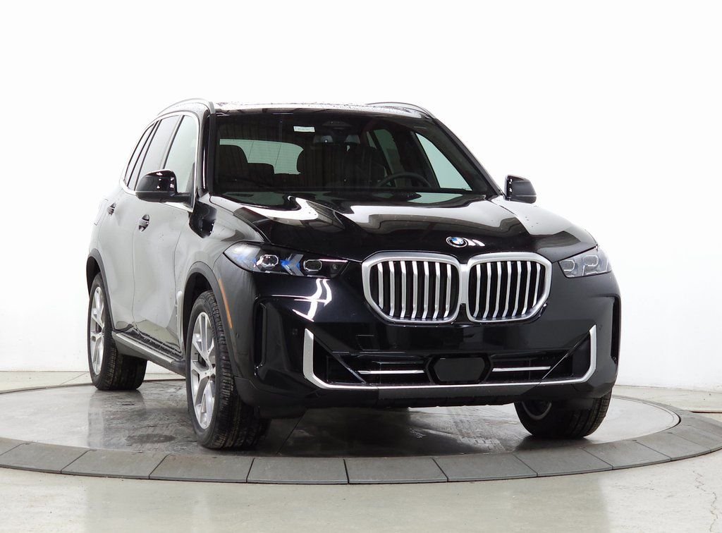 Used 2026 Black Sapphire Metallic BMW xDrive40i image 1