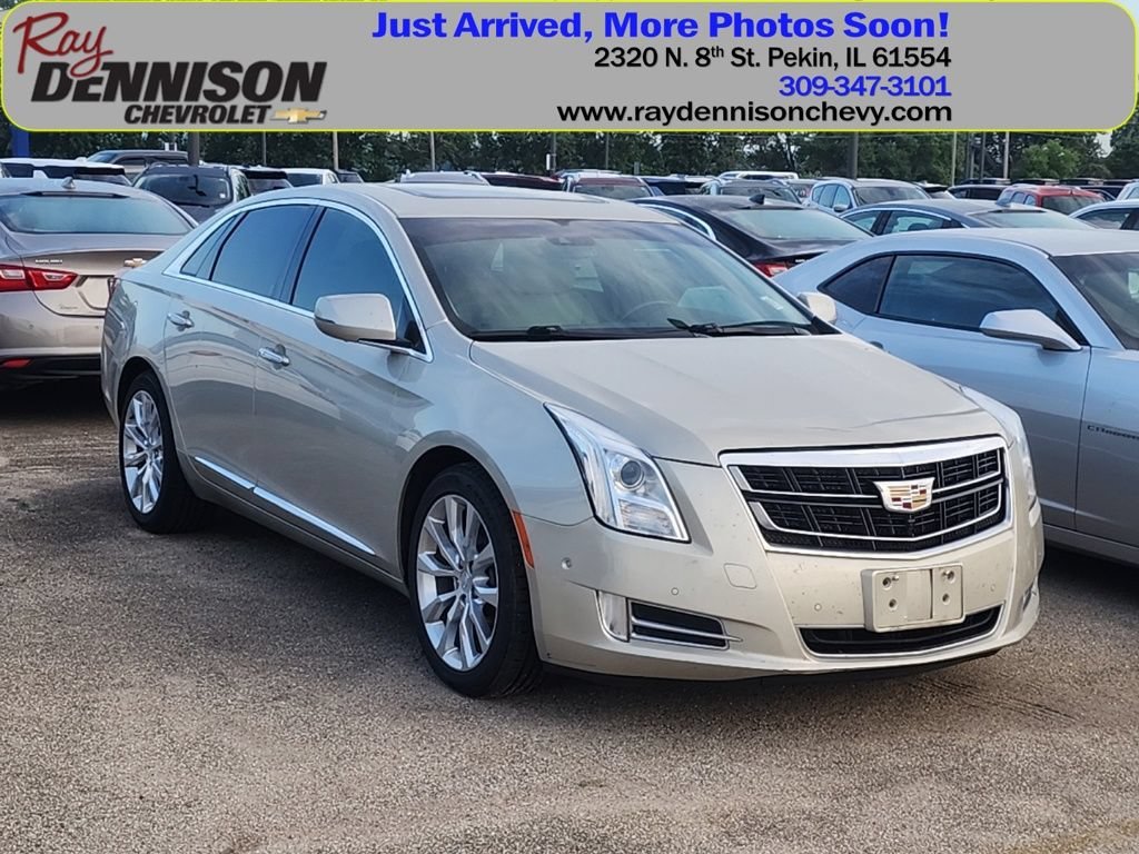 Used 2016 SILVER COAST METALLIC Cadillac Luxury Collection image 1