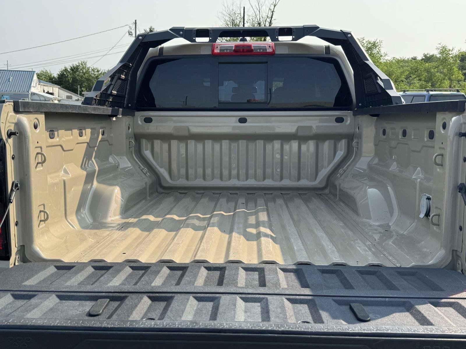 Used 2023 Desert Sand Metallic GMC 4WD AT4 image 19