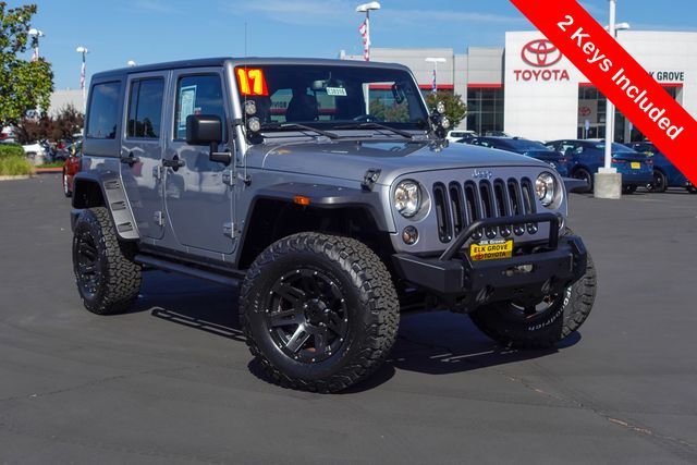 Used 2017 Silver Jeep Unlimited Sport image 2