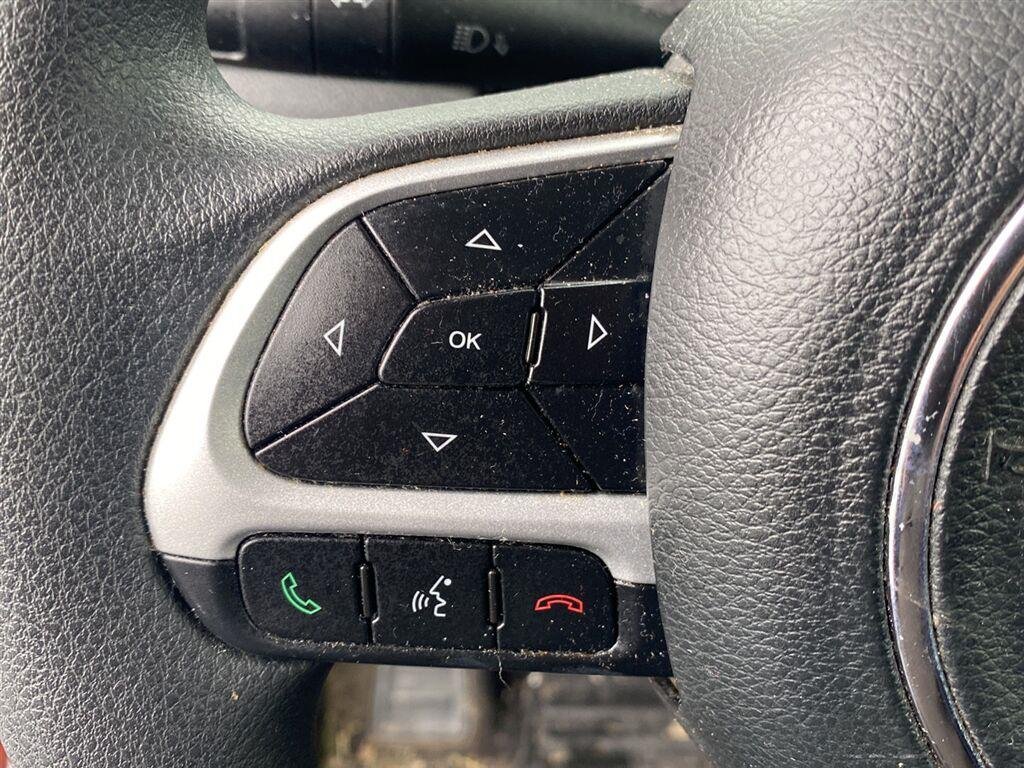 Used 2018 Omaha Orange Jeep Sport image 18