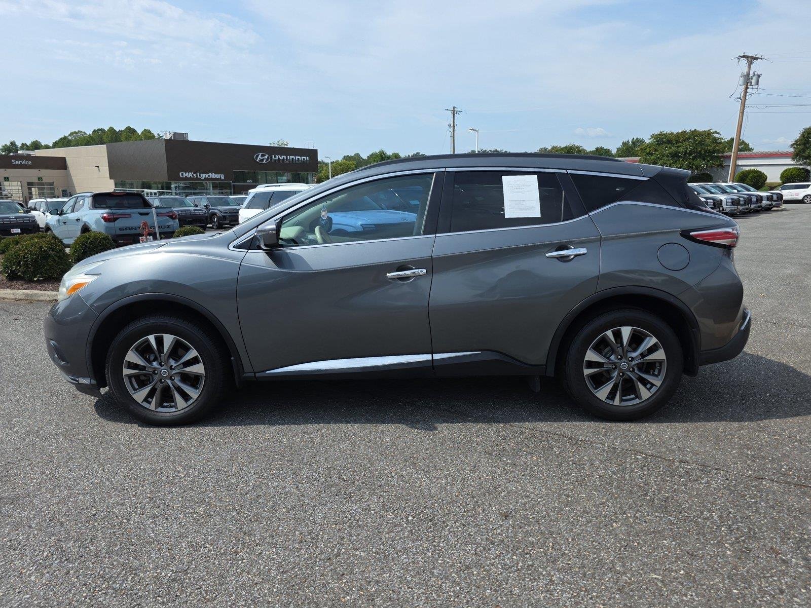 Used 2016 Gun Metallic Nissan SV image 7