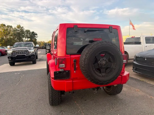 Used 2015 Red Jeep Unlimited Sahara image 8
