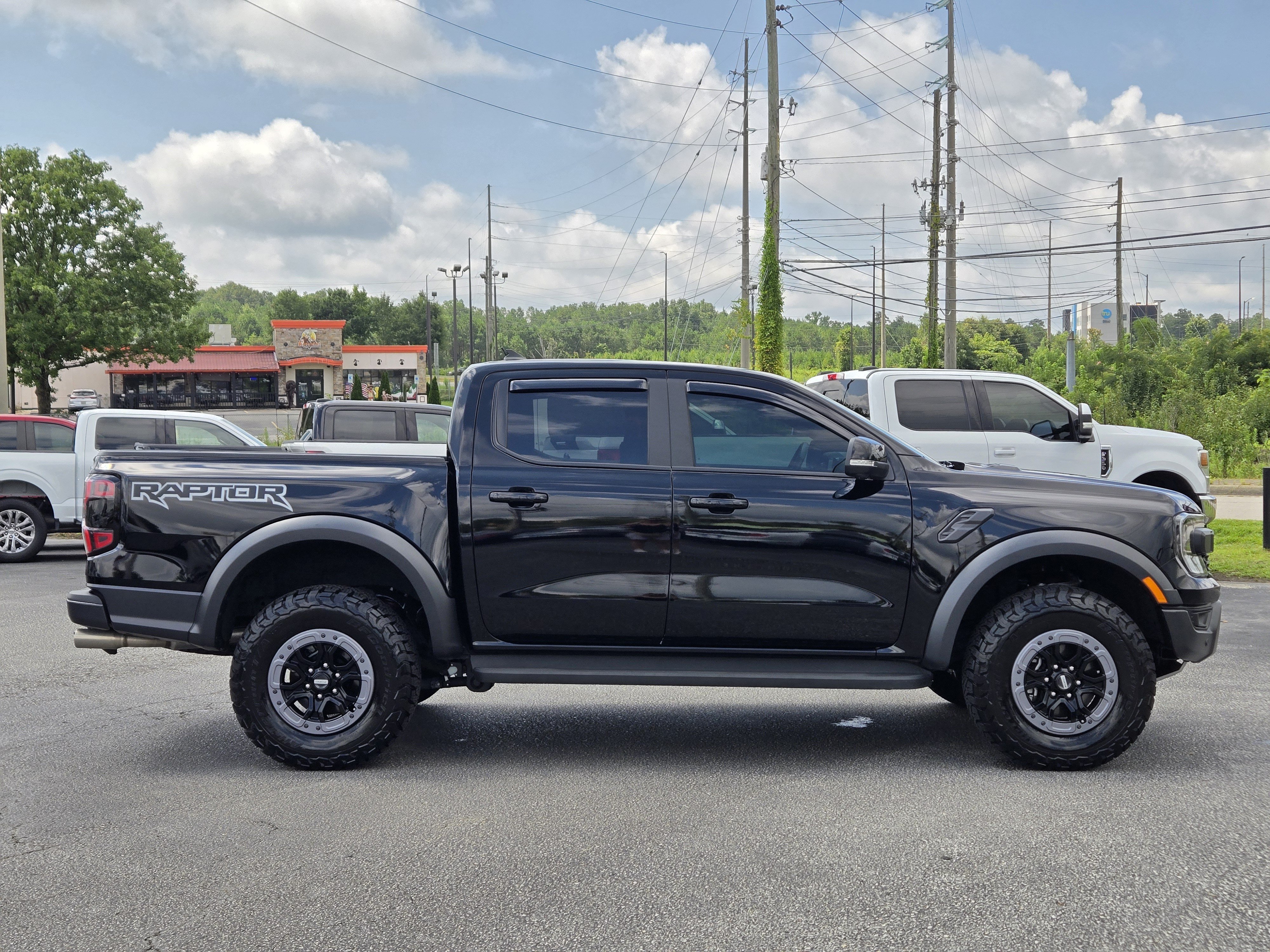 Used 2025 Shadow Black Ford Raptor image 7