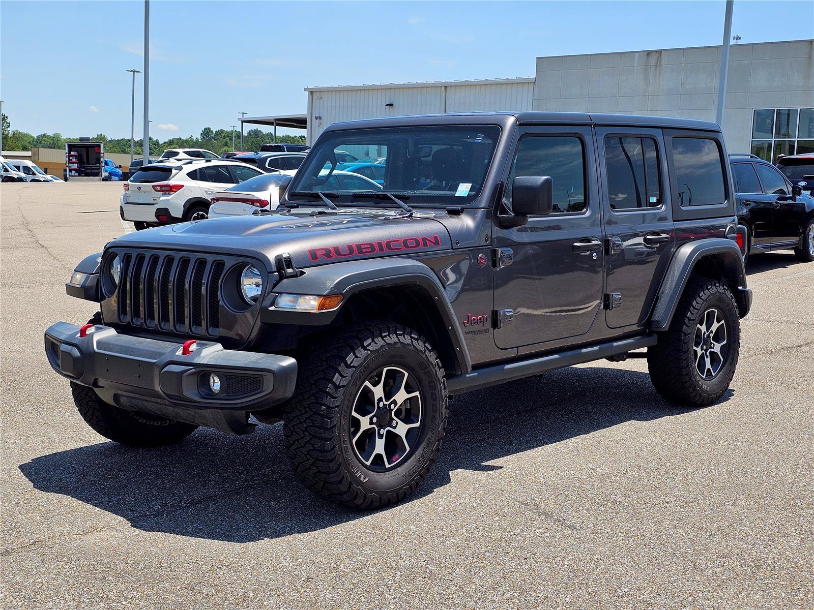 Used 2021 Granite Crystal Metallic Clearcoat Jeep Unlimited Rubicon image 1