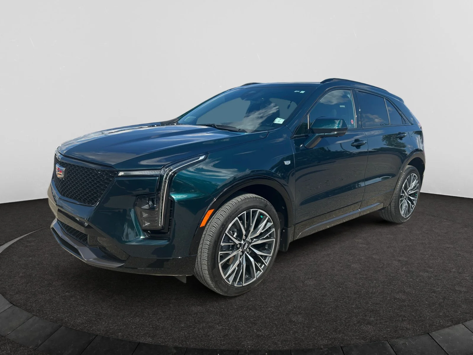 Used 2025 EMERALD LAKE GREEN Cadillac AWD Sport image 1