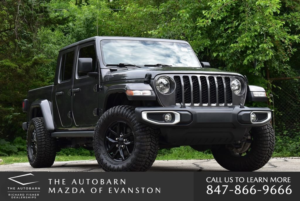 Used 2022 Crystal Metallic Jeep Sport image 1