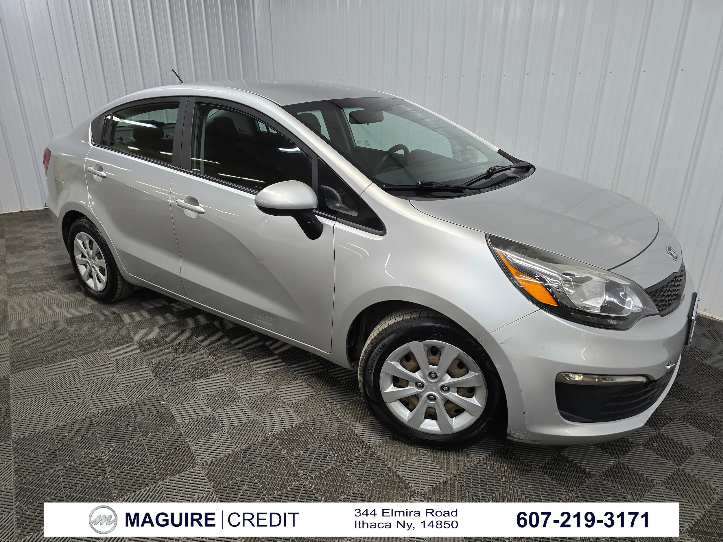 Used 2016 Bright Silver Kia LX FWD image 1