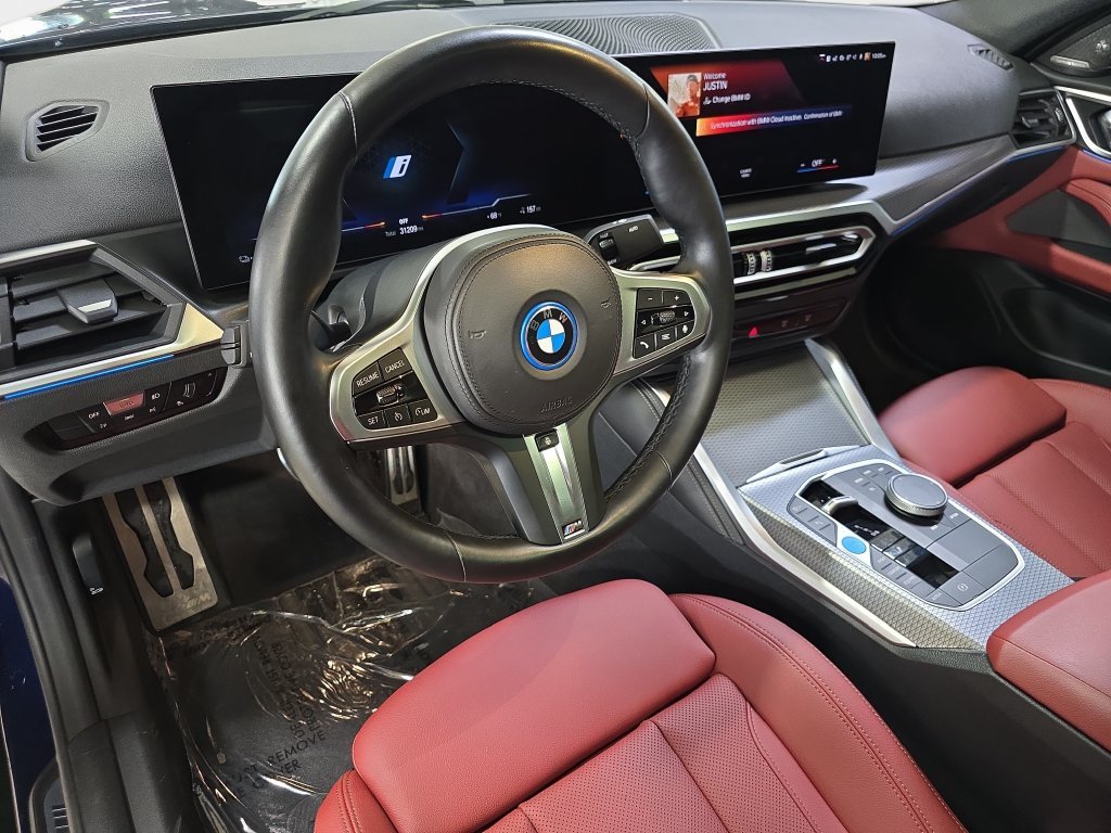 Used 2023 Tanzanite Blue II Metallic BMW eDrive40 image 19