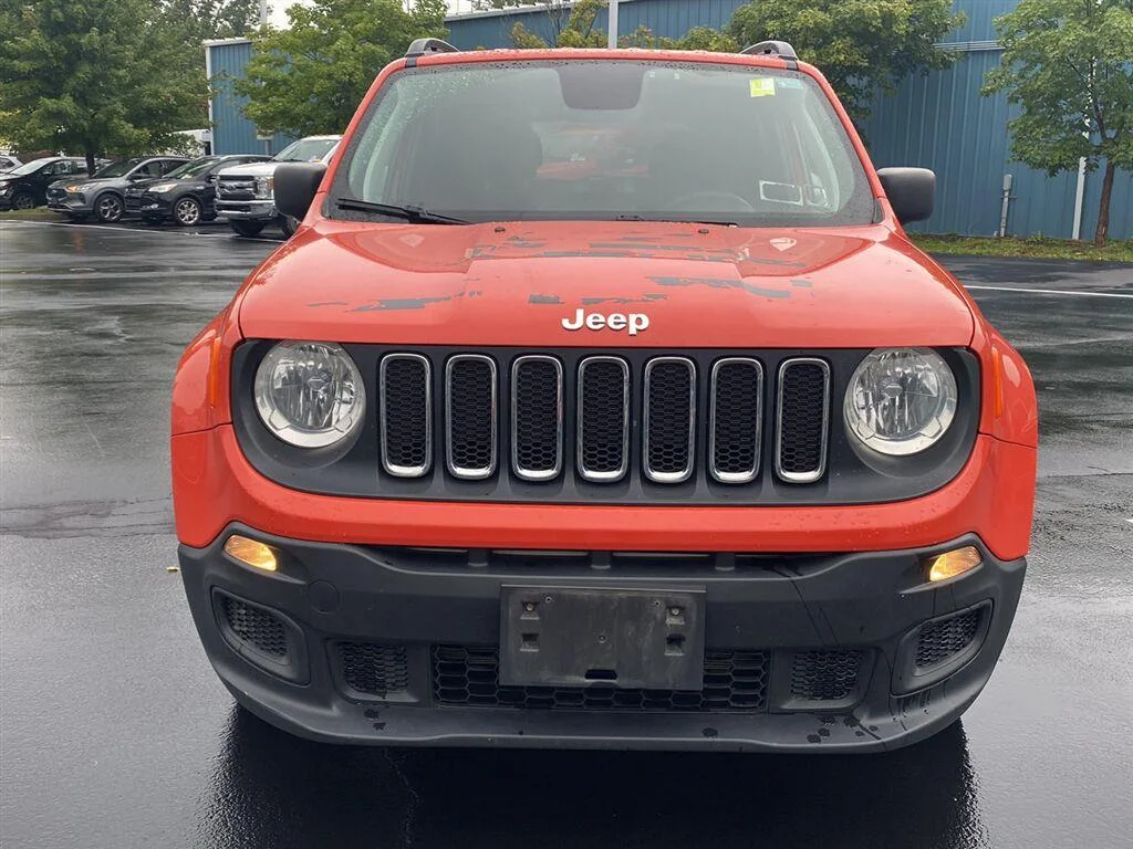 Used 2018 Omaha Orange Jeep Sport image 5