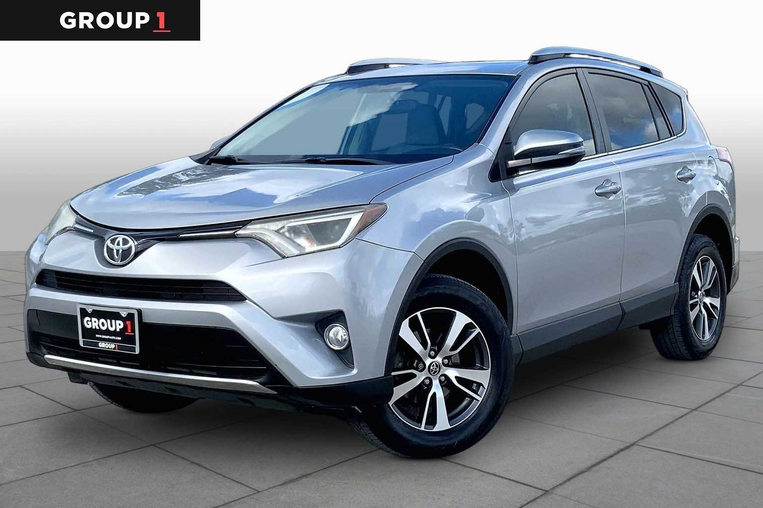 Used 2016 Silver Sky Metallic Toyota XLE image 1