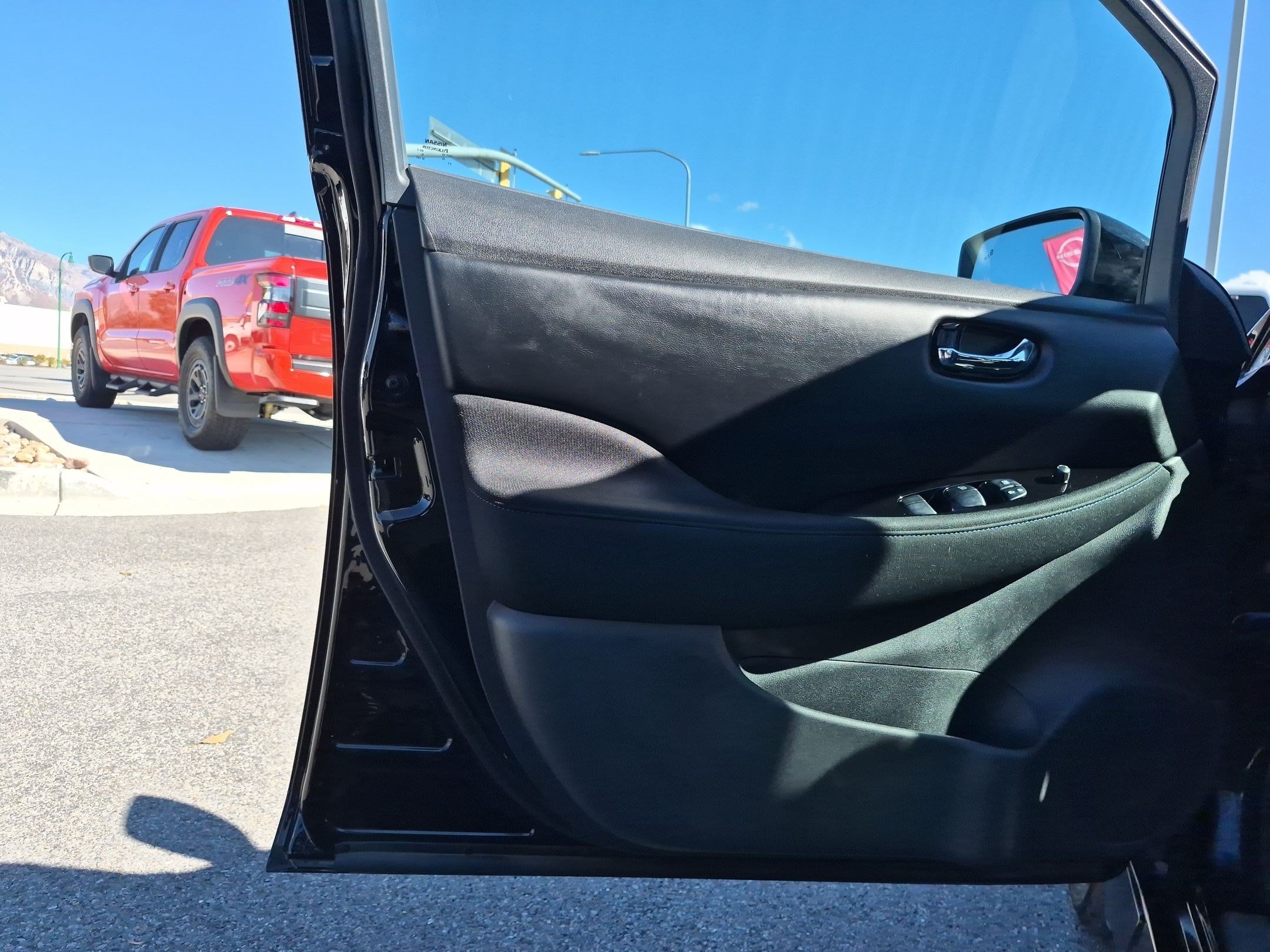 Used 2025 Super Black Nissan SV PLUS image 12