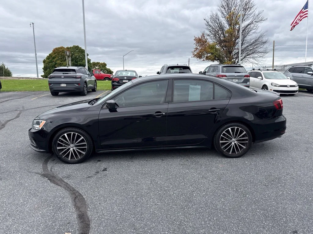 Used 2016 Black Uni Volkswagen 1.8T Sport image 8