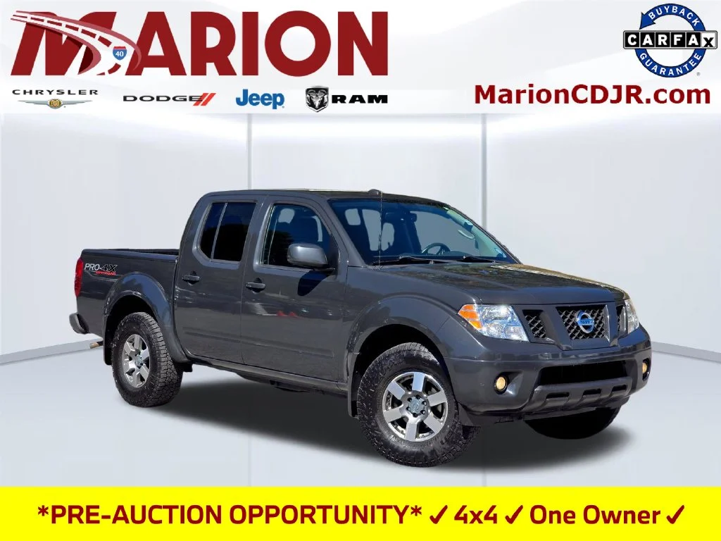 Used 2011 Black Nissan PRO-4X image 1