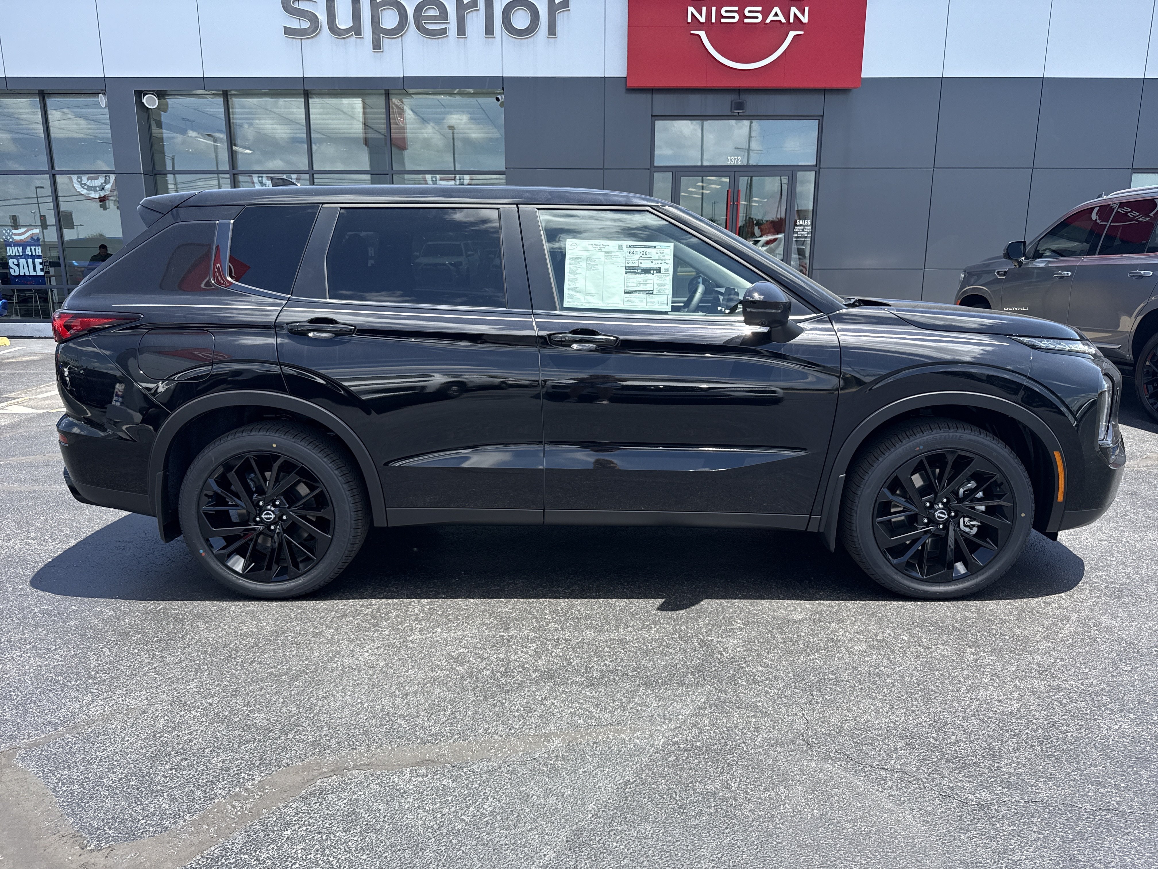 New 2026 Cosmic Black Nissan SL AWD image 2