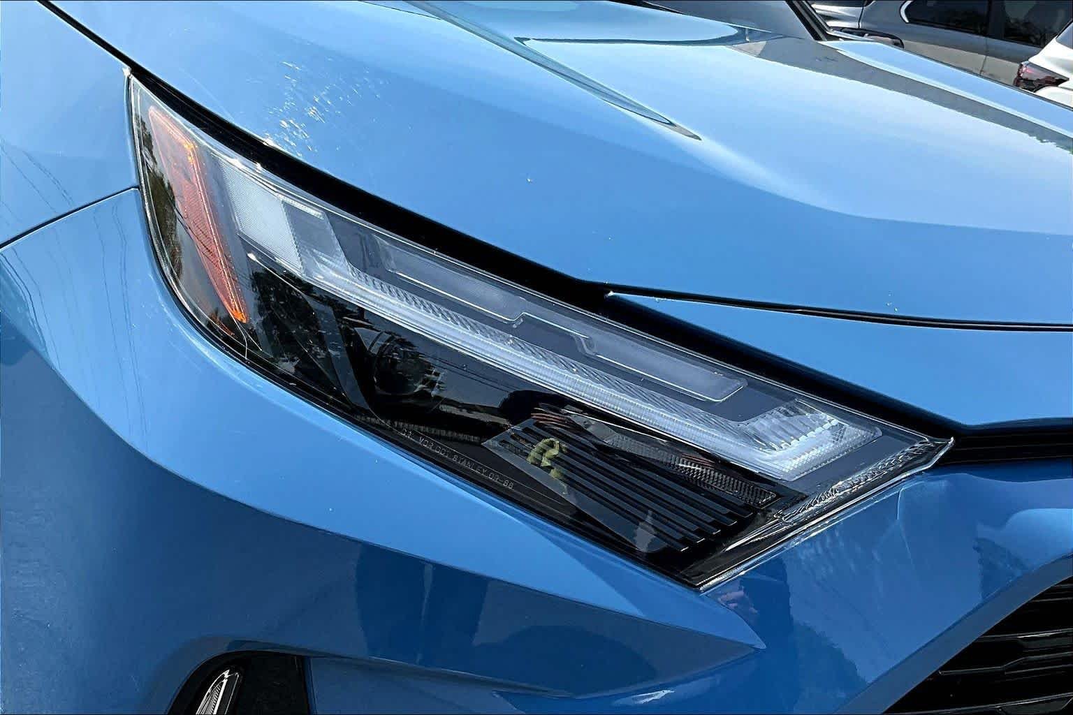 Used 2024 Cavalry Blue/Midnight Black Metallic Toyota Hybrid XSE image 27