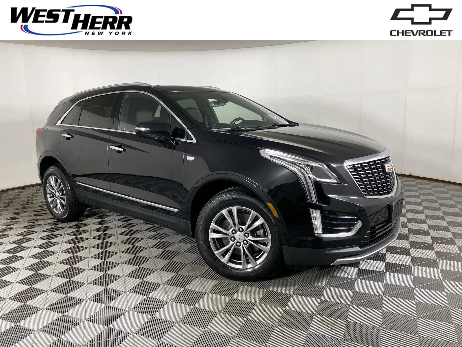 Used 2023 STELLAR BLACK METALLIC Cadillac AWD Premium Luxury image 1