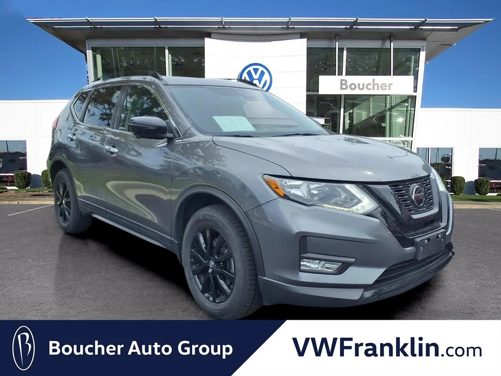 Used 2018 Gun Metallic Nissan SV image 1