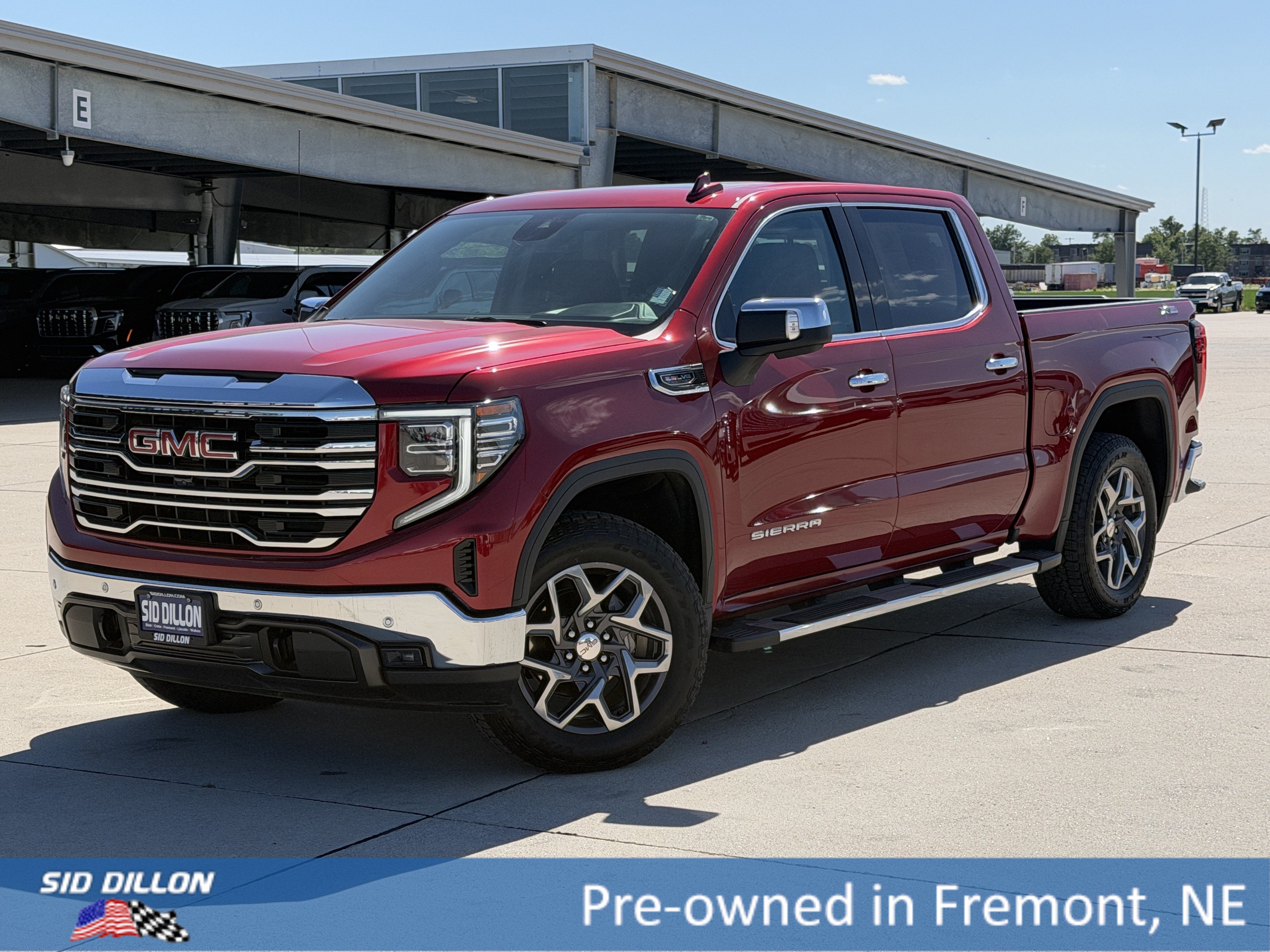 Used 2025 Volcanic Red Tintcoat GMC SLT image 1