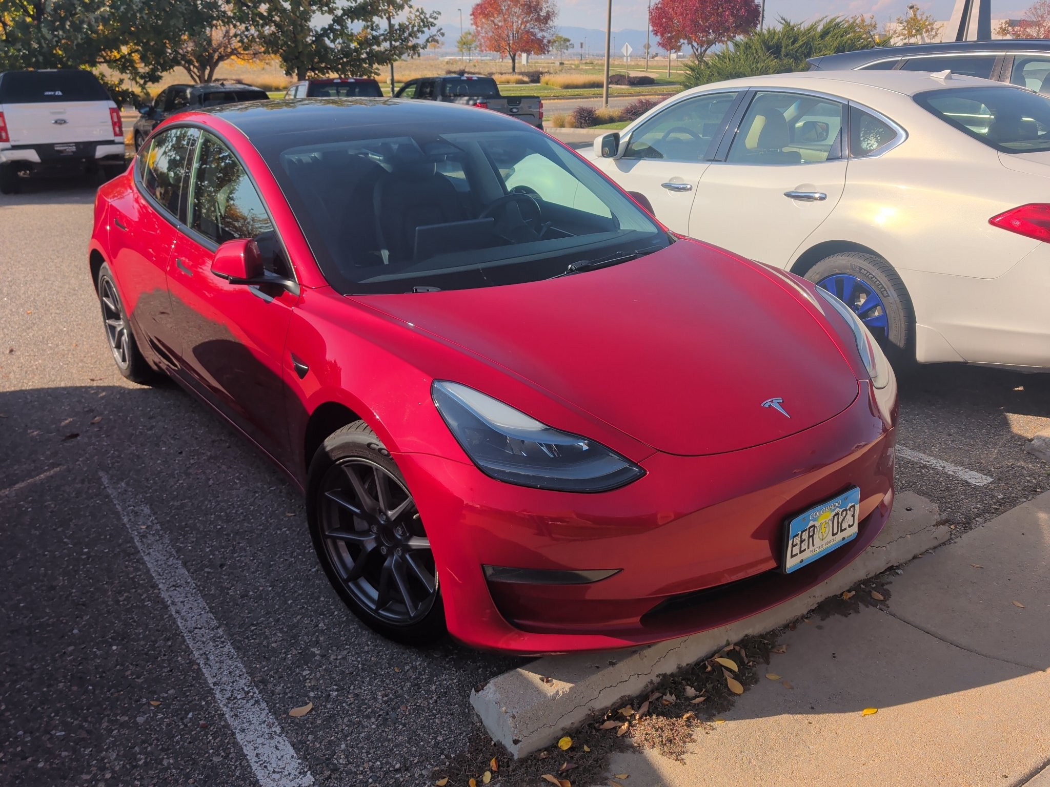Used 2023 Red Multi-Coat Tesla Base image 2