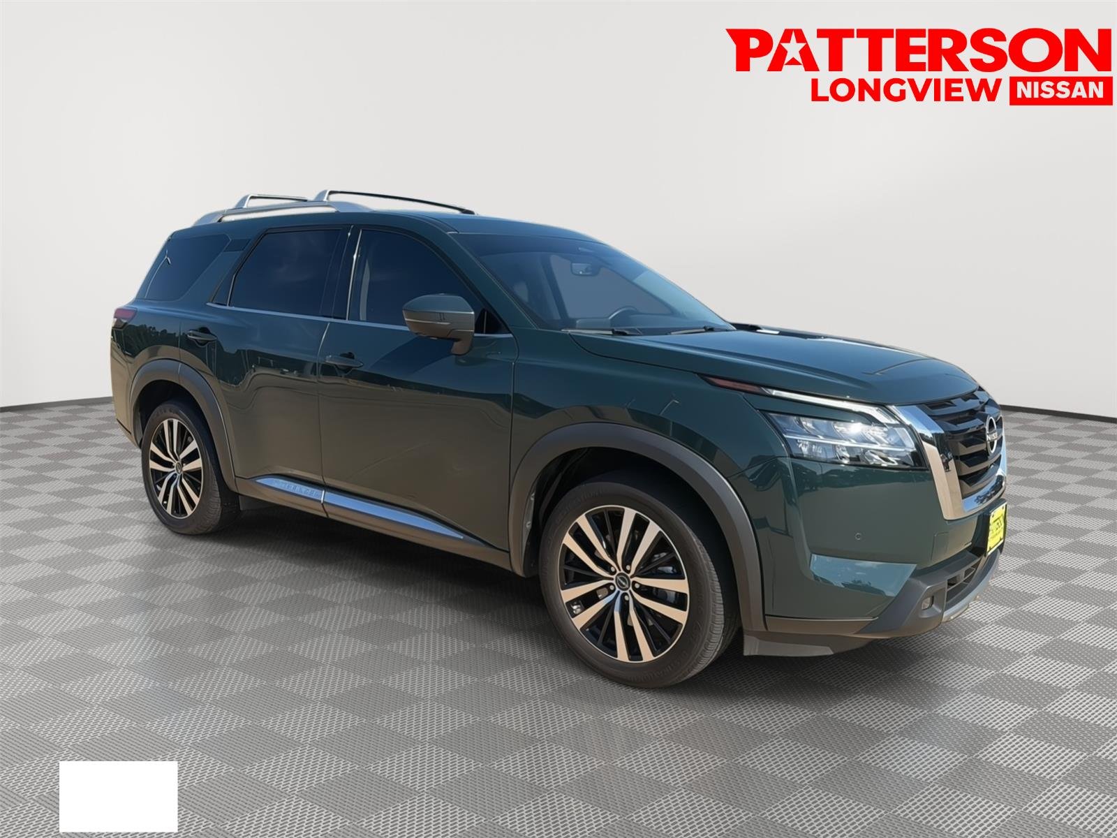 Used 2023 Obsidian Green Pearl Nissan Platinum image 1