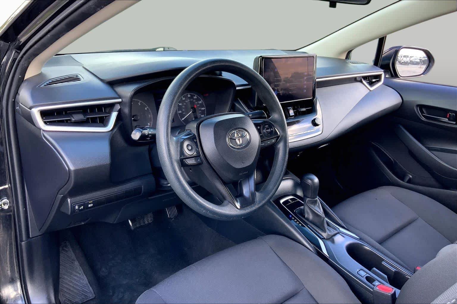 Used 2023 Midnight Black Metallic Toyota LE image 17