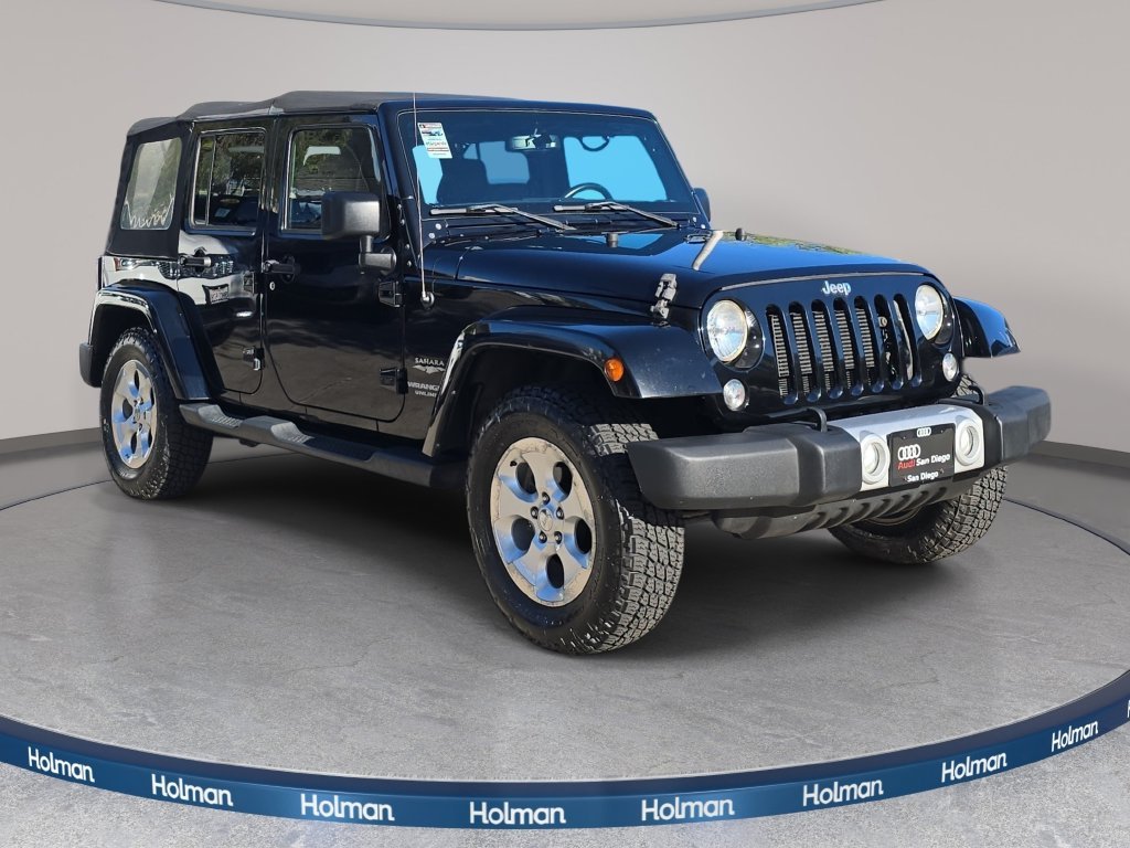Used 2015 Black Jeep Unlimited Sahara image 4