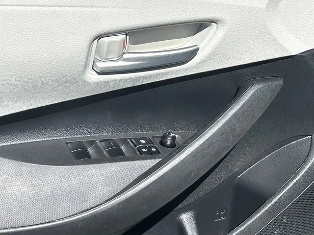 Used 2021 Super White Toyota LE image 19