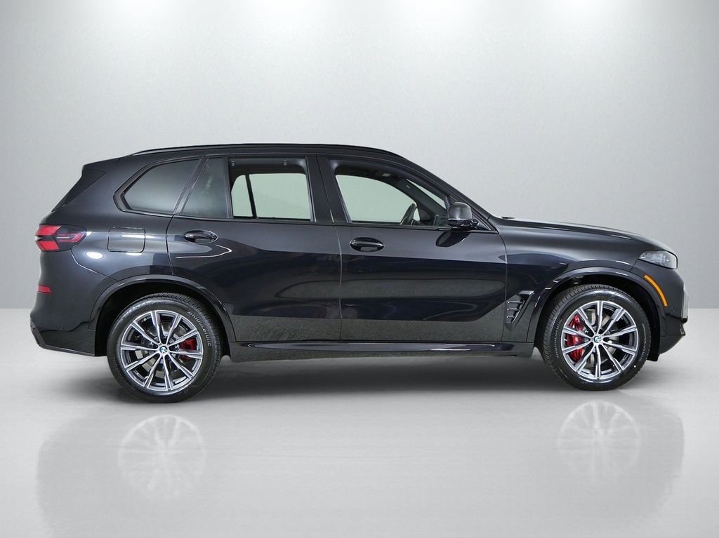 New 2026 Black Sapphire Metallic BMW xDrive40i image 8